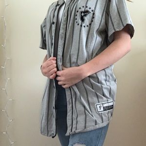 FAMOUS grey and black striped jersey